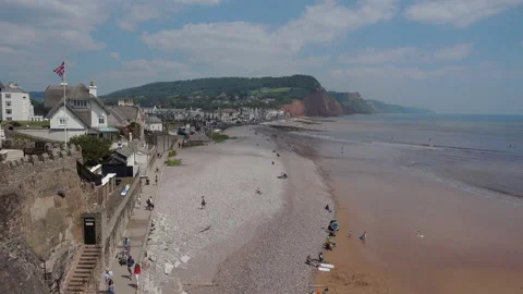 High wideangle view of Sidmouth in Devon.  Pebble beaches and sunshine Video stock 156191164
