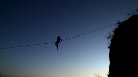 High-Wire Tight Rope Walker Prepares for Scary Balancing Vertigo Feat Stock Footage 56765851