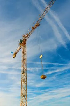 High yellow working crane Stock Photos