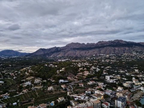 Highaltitude perspective of settlement, Elevated shot featuring clustered h.. Stock Photos