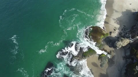 Higher View - Ocean Hitting the Rocks Stock Footage 217407726