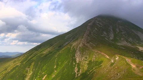 Highest mountain peak covered clouds. Stock Footage 80732365