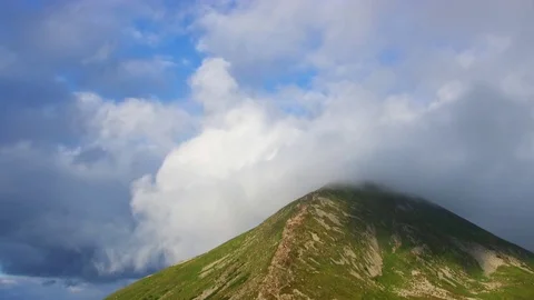 Highest mountain peak covered clouds. Stock Footage 81195496