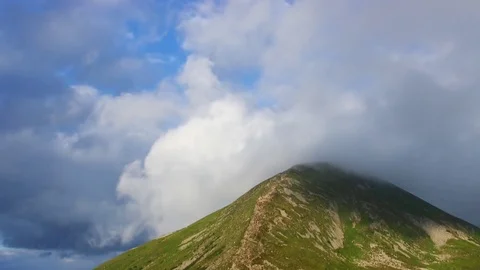 Highest mountain peak covered clouds. Stock Footage 82718298