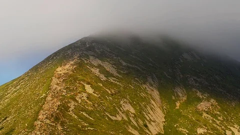 Highest mountain peak covered clouds. Stock Footage 82763664