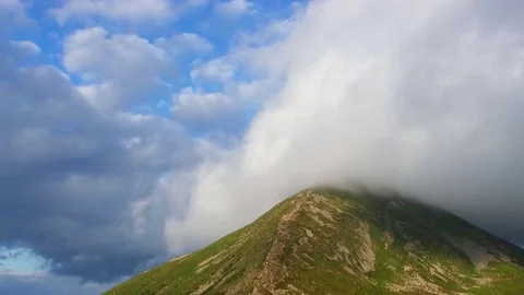 Highest mountain peak covered clouds. Stock Footage 83237464