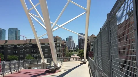 The Highland Bridge is the third of three pedestrian bridges to connect Downtown Stock Footage 68509481