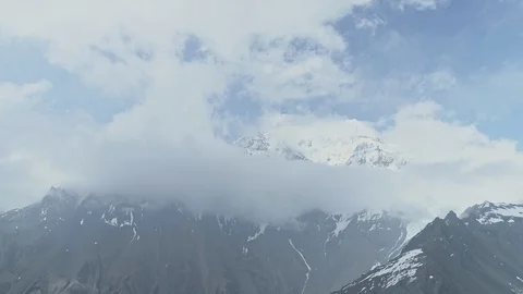 Highland panorama, misty clouds hide snow peak of Annapurna mountain, Nepal Stock Footage 124684599
