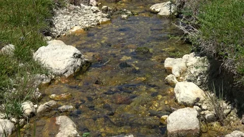 Highland stream running away Stock Footage 195339622