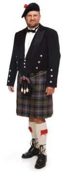 Highlander in kilt on white Foto stock
