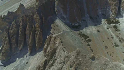 Highlands scree slope, trekking path among rocky crests and steep cliffs, Nepal Stock Footage 124679265