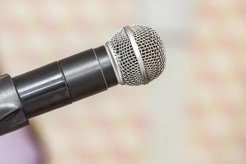Highlight of an audio microphone at an event Stock Photos