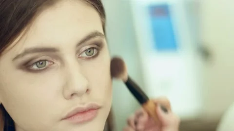 Highlight the cheeks in the makeup Video stock 62614680