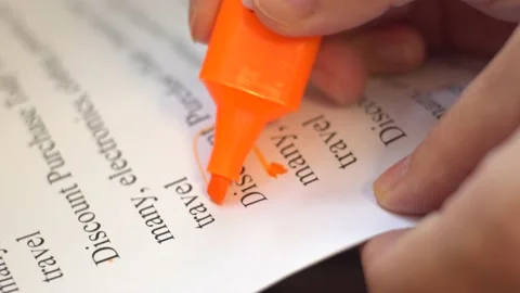 Highlight a word on paper Stock Footage 139689247