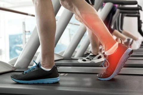 Highlighted ankle of man on treadmill Stock Illustration