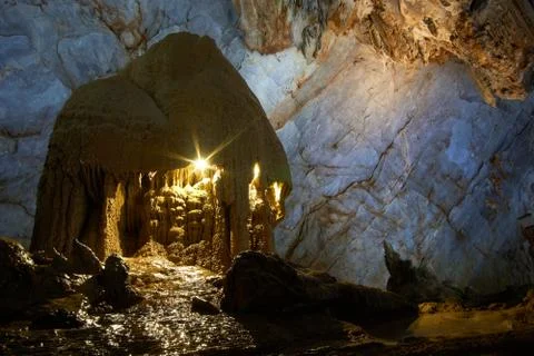 Highlighted limestone formations in the Paradise Cave or Thien doung cave Stock Photos