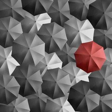 Highlighted red umbrella among multiple colourful umbrellas Foto stock