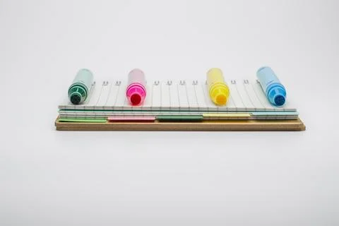 Highlighters and notebook for creative planning and back to school, isolate.. Fotos de archivo