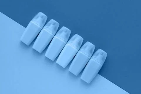 Highlighters set on colored blue background. Flat lay, top view. Trendy color Stock Photos