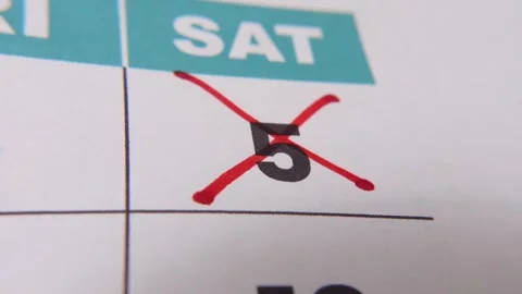 Highlighting date number 5 on a calendar, with a bold red cross mark Stock Footage 318468302