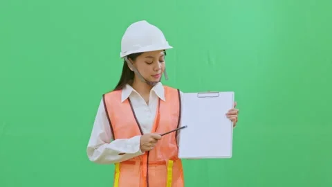 Highlighting Safety Issues Pointing at Clipboard Data Green Screen Stock Footage 331629675