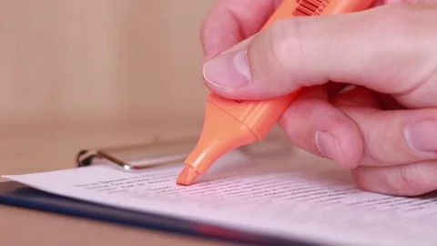 Highlighting text with orange marker Stock Footage 85167442