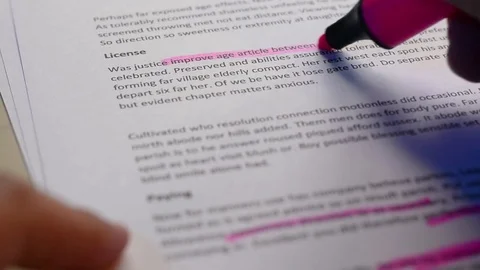 Highlighting text on a sheet of paper Stock Footage 78563872