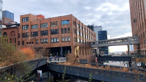 The Highline is a public park built on an historic freight rail line elevated Stock Footage 126046477