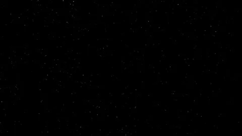 Highly detailed dust particles flying over a black background Stock Footage 340960500