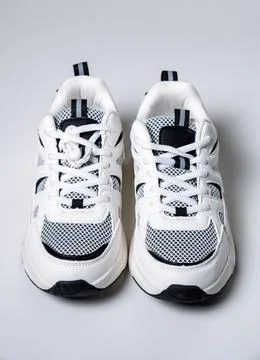 Highquality studio image presenting athletic sneakers with cushioned sole and Stock Photos