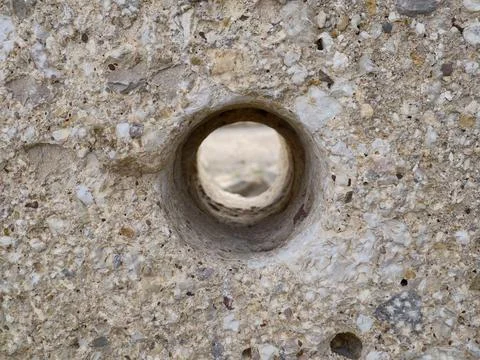 Highresolution capture of weathered sandstone with circular voids and nuanc.. Stock Photos