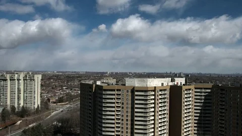 Highrise Buildings with Clouds - time-lapse Stock Footage 73234436