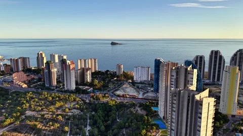 Highrise Scene Of Ocean And Shadows, Bright Sunlight Over Towers Casting Stock Footage 323676541
