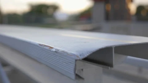 A highschool baseball bench with no players, Salt Lake City, Utah. Video stock 144458027