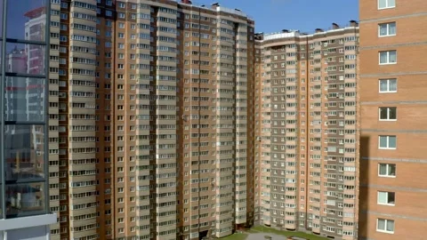 Hight building made of bricks where people live Stock Footage 153600396