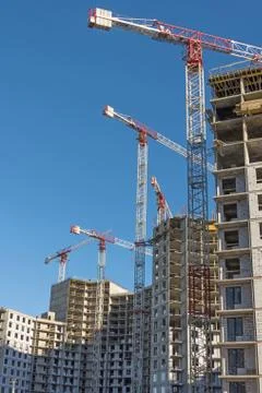 Hight construction cranes, large-scale construction of a residential complex Stock Photos