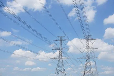 Hight voltage tower line on the cloudy sky background. Stock Photos
