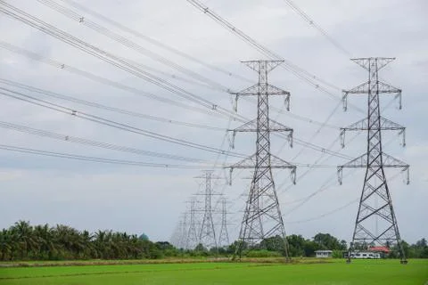 Hight voltage tower line on the cloudy sky background. Stock Photos