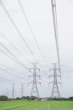Hight voltage tower line on the cloudy sky background. Stock Photos
