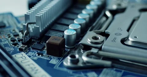 Hightech closeups of computer motherboards and processors, showcasing intricate Stock-Footage 273698344