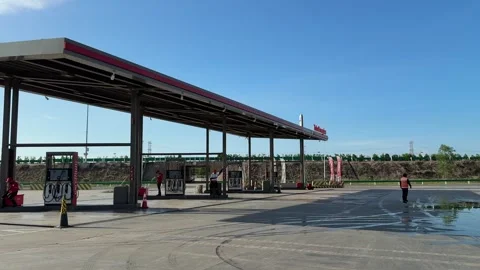 Hightway Gas Station Pit Stop Featuring Intergrated Food Hall and Market Stock Footage 337050990