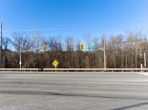 Highway 11 intersection: traffic lights and road signs Foto stock