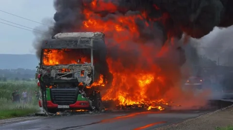 Highway accident. Burning truck on a road Stock Footage