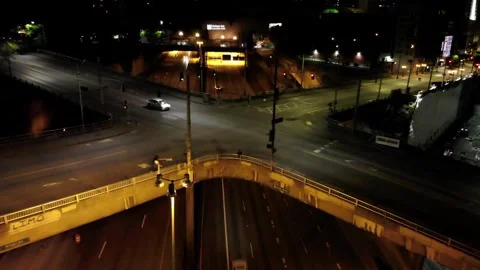 Highway and 4 Way Intersection, Night, Seattle, Aerial Pullaway Stock Footage 146553470