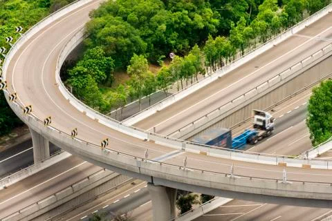 Highway and freight train Stock Photos