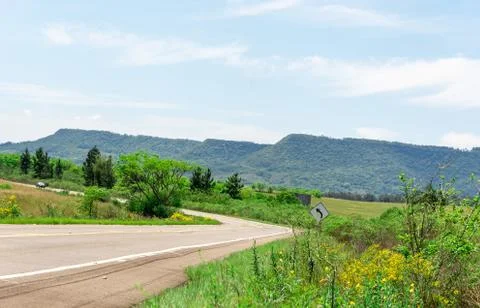 The highway and the general mountain range in the background Stock Photos