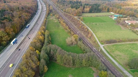 Highway and high speed train track - aerial view Stock Footage 82184833