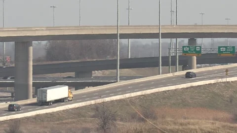 Highway and road infrastructure with car and truck traffic driving Vídeo Stock 151662670