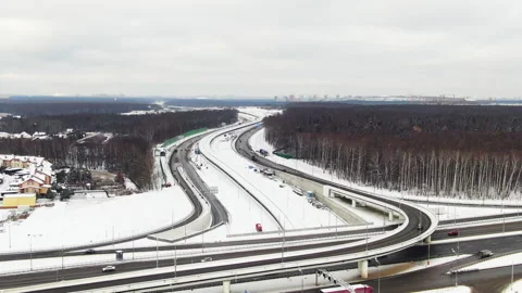 Highway in an array of trees. Forest belt in Russia. The road passing near the Stock Footage 155466240