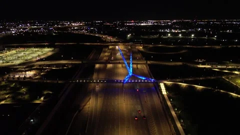 Highway with art installation at night Stock Footage 240153582